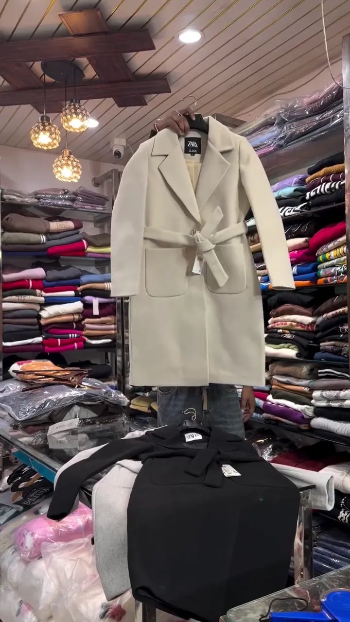 Cream Longline Belted Overcoat with Notch Lapel Collar, Patch Pockets and Tie‑Up Waist for Elegant Winter Layering